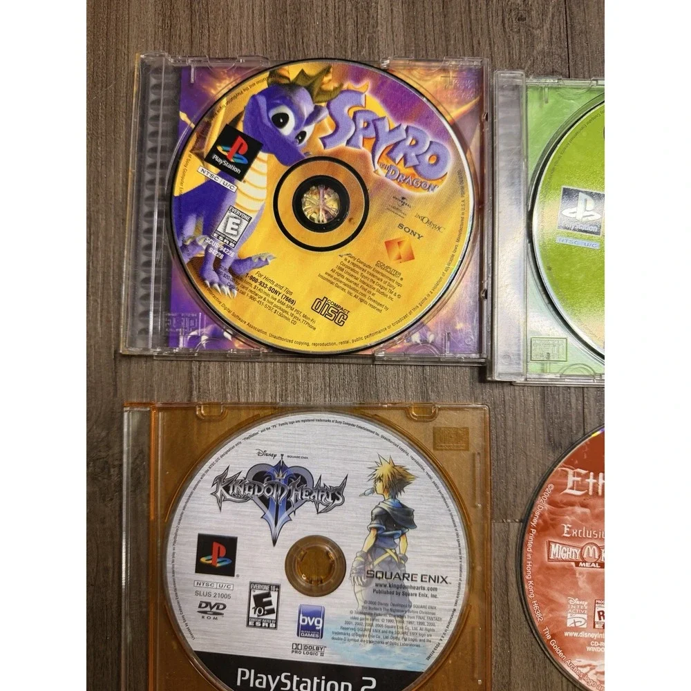 Lot of 4 Vintage Video Game Discs PS1 PlayStation 2 PC Spyro Frogger Kingdom